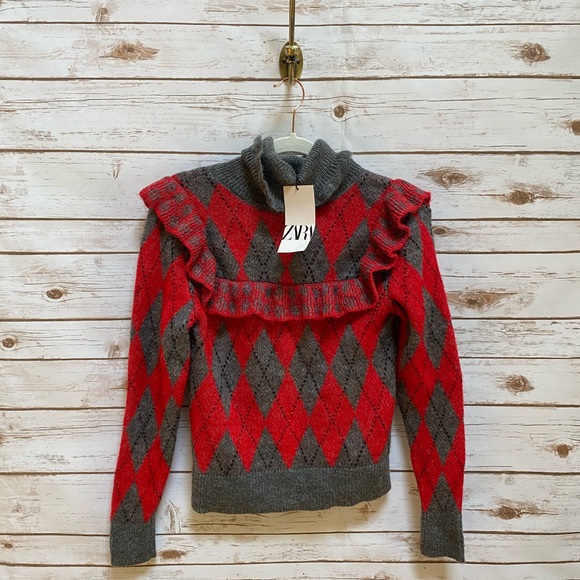 red and gray sweater
